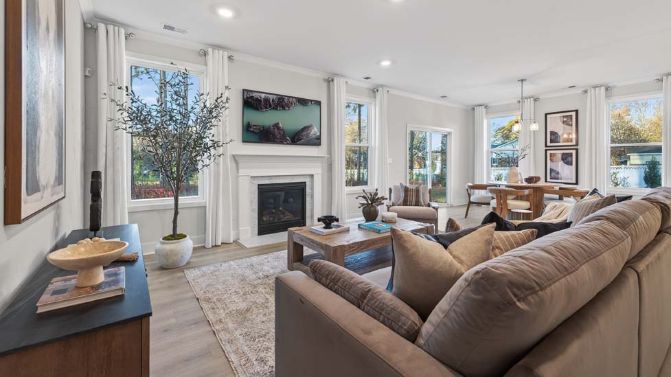 Open concept living area with windows