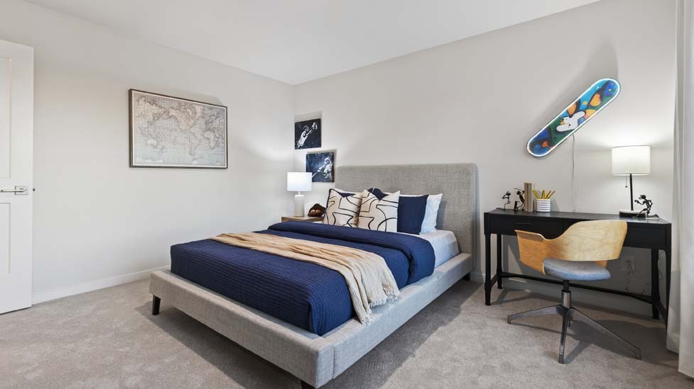 Carpeted bedroom with window
