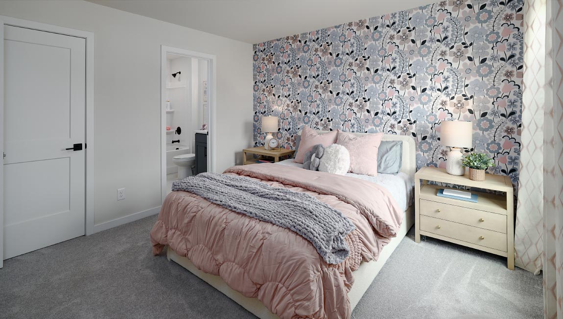 Carpeted bedroom with windows