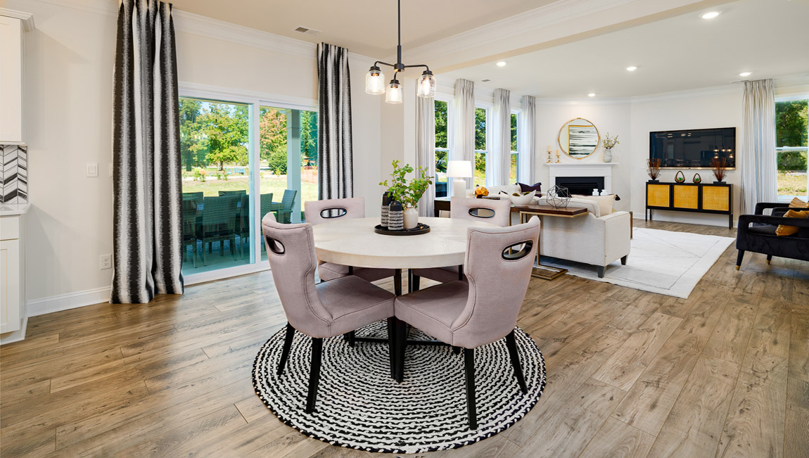 Breakfast area beside kitchen living room, and  sliding glass back door