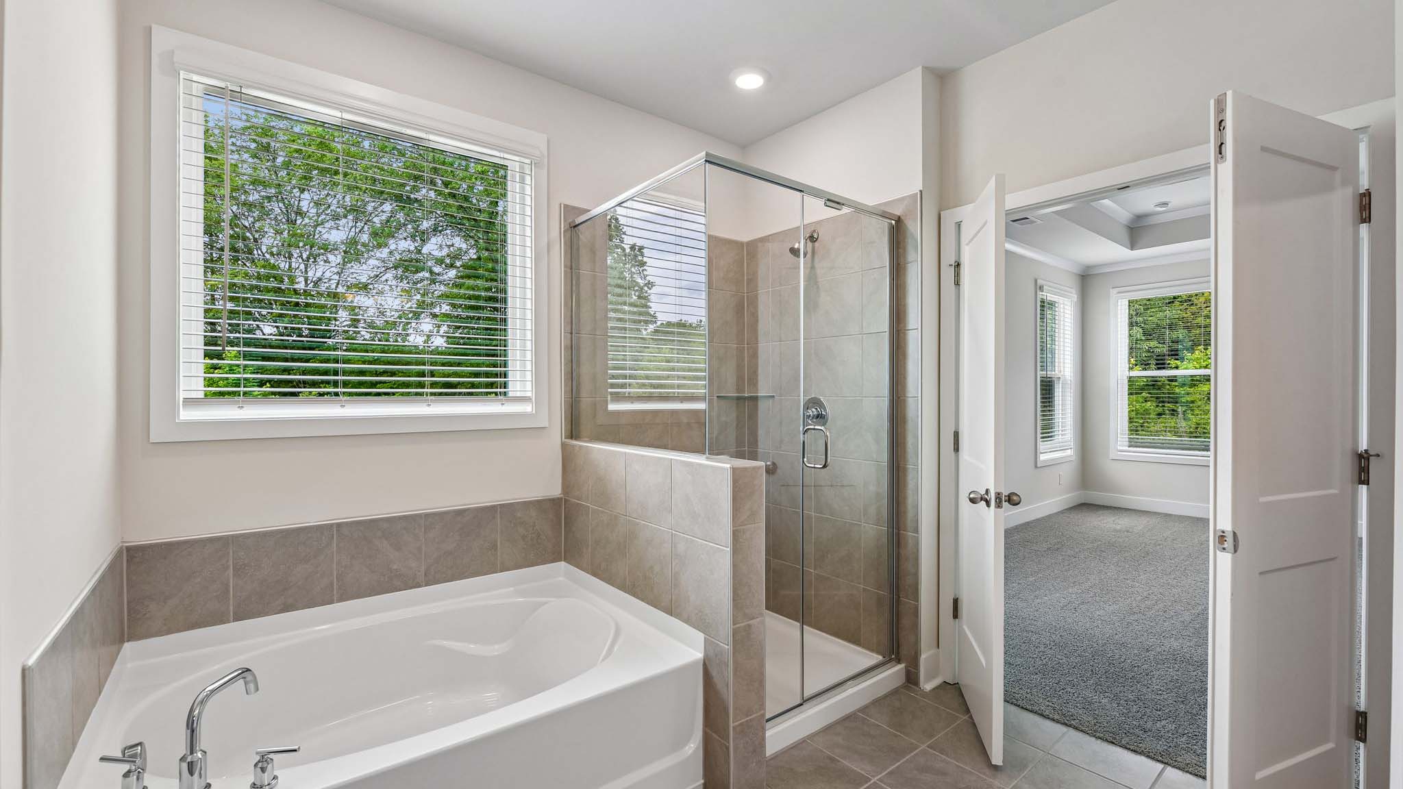 Primary bathroom with standing glass shower