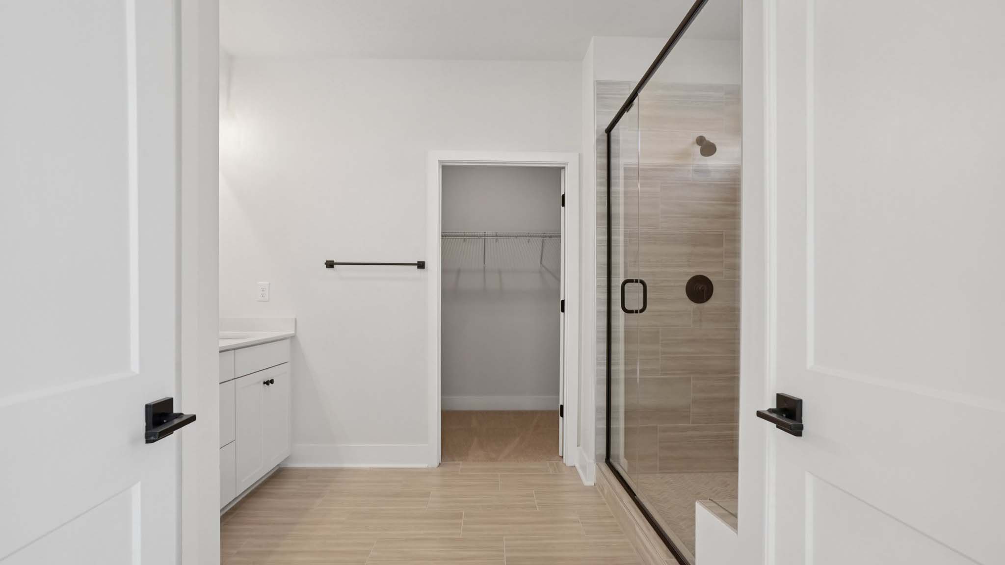 Primary bathroom with standing glass shower