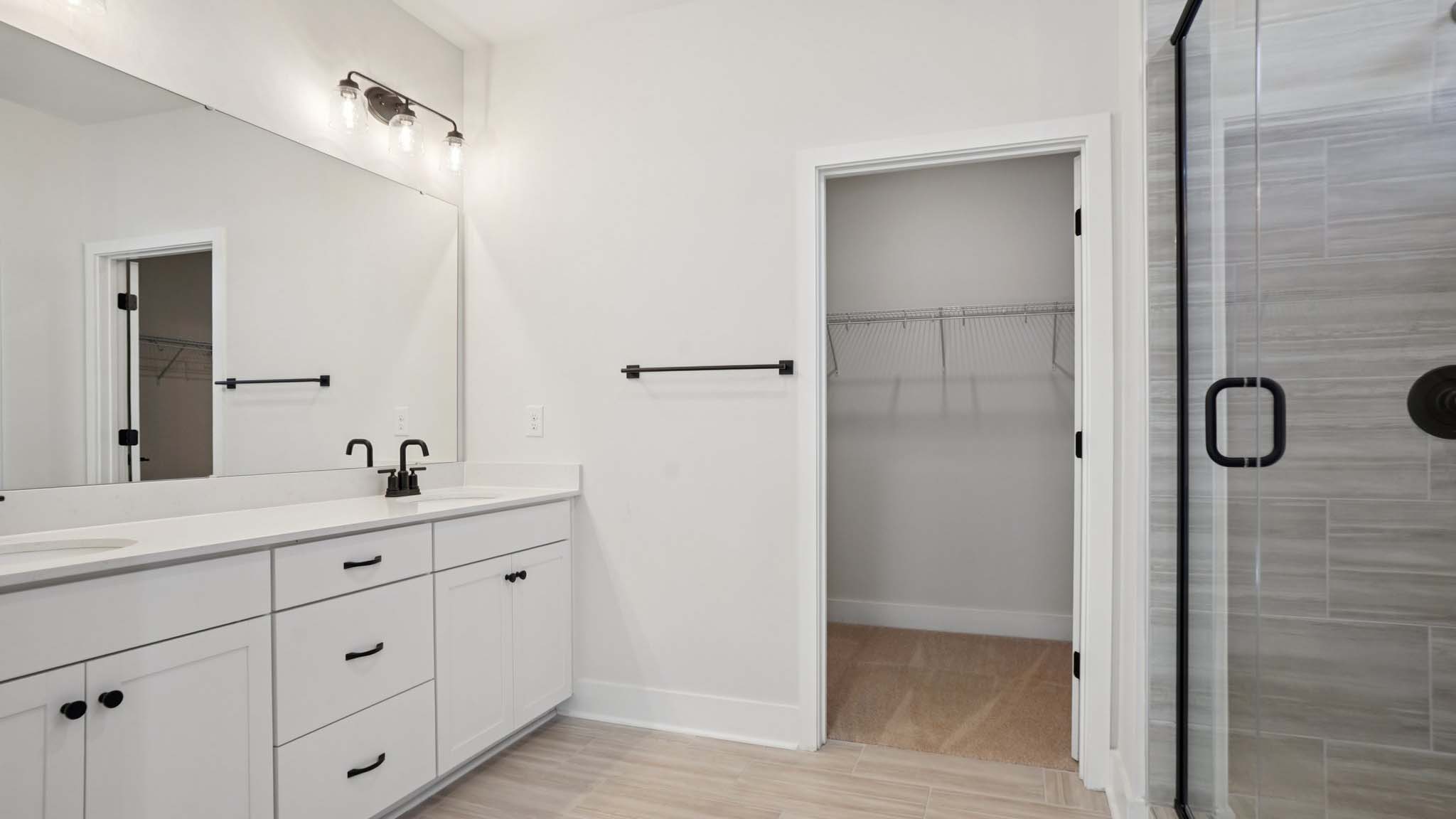 Primary bathroom with standing glass shower