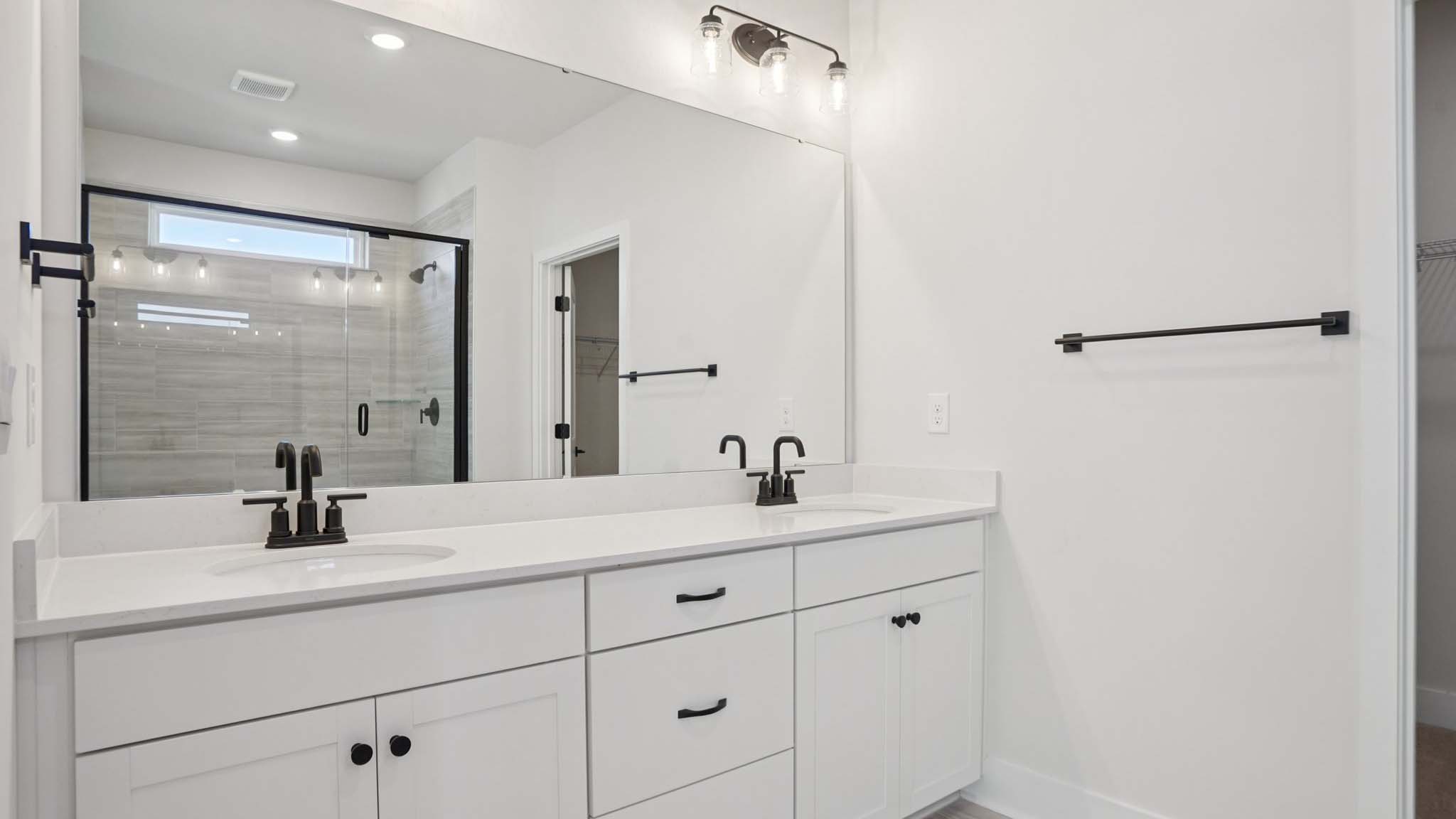 Primary bathroom with standing glass shower