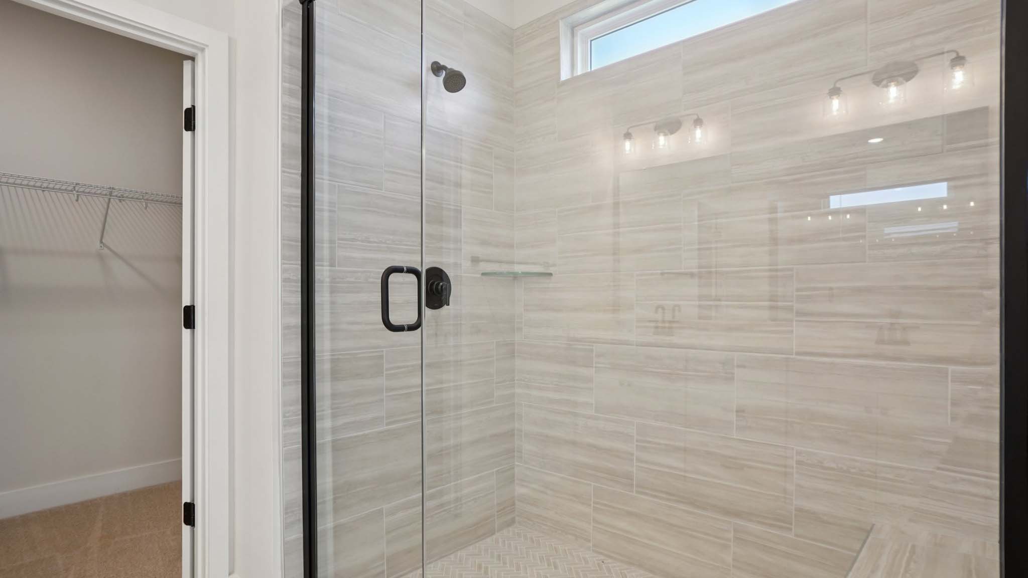 Primary bathroom with standing glass shower