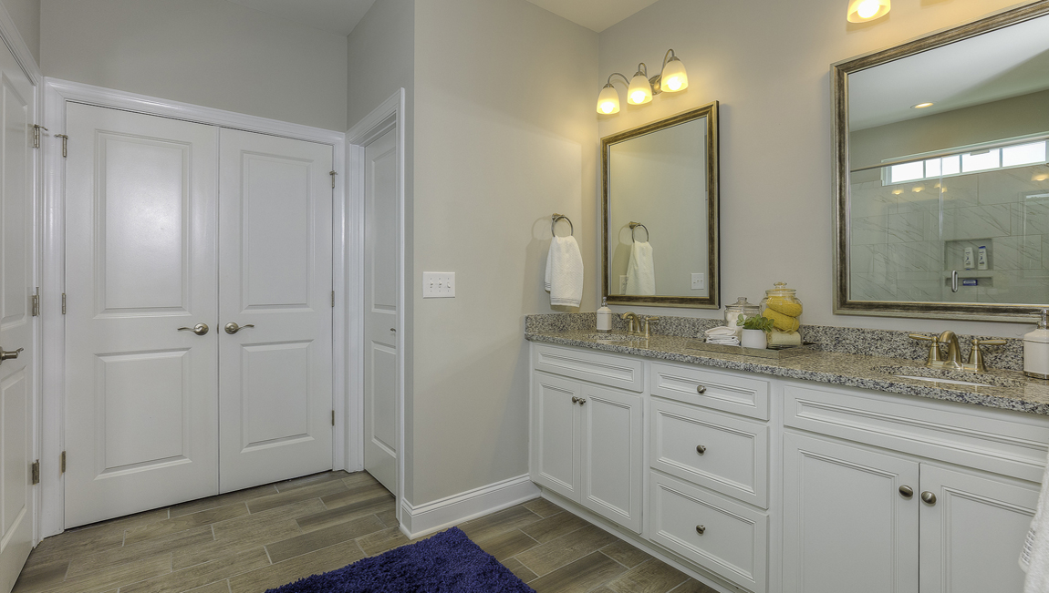 Primary bathroom with double sink vanity
