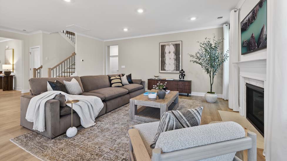 Breakfast area off the kitchen with large windows and sliding glass back door
