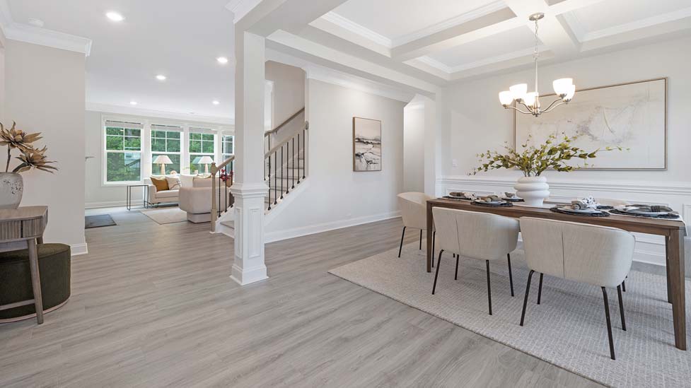 Welcoming foyer with view of front door and french doors to flex room