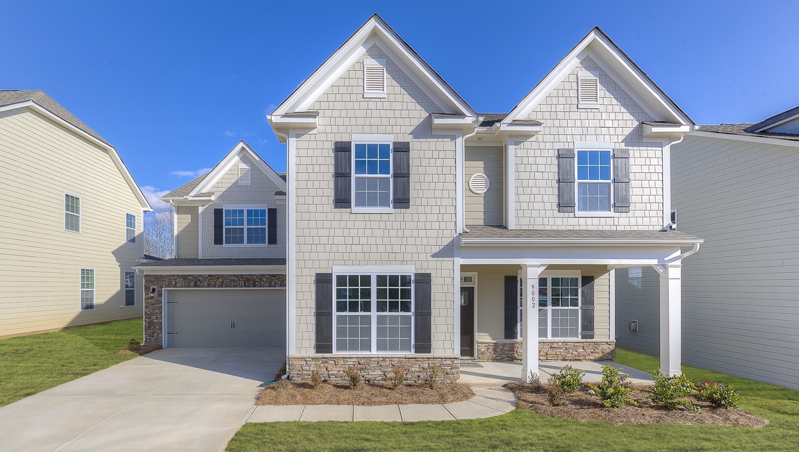 Kristin front exterior rendering with siding, brick and two car garage