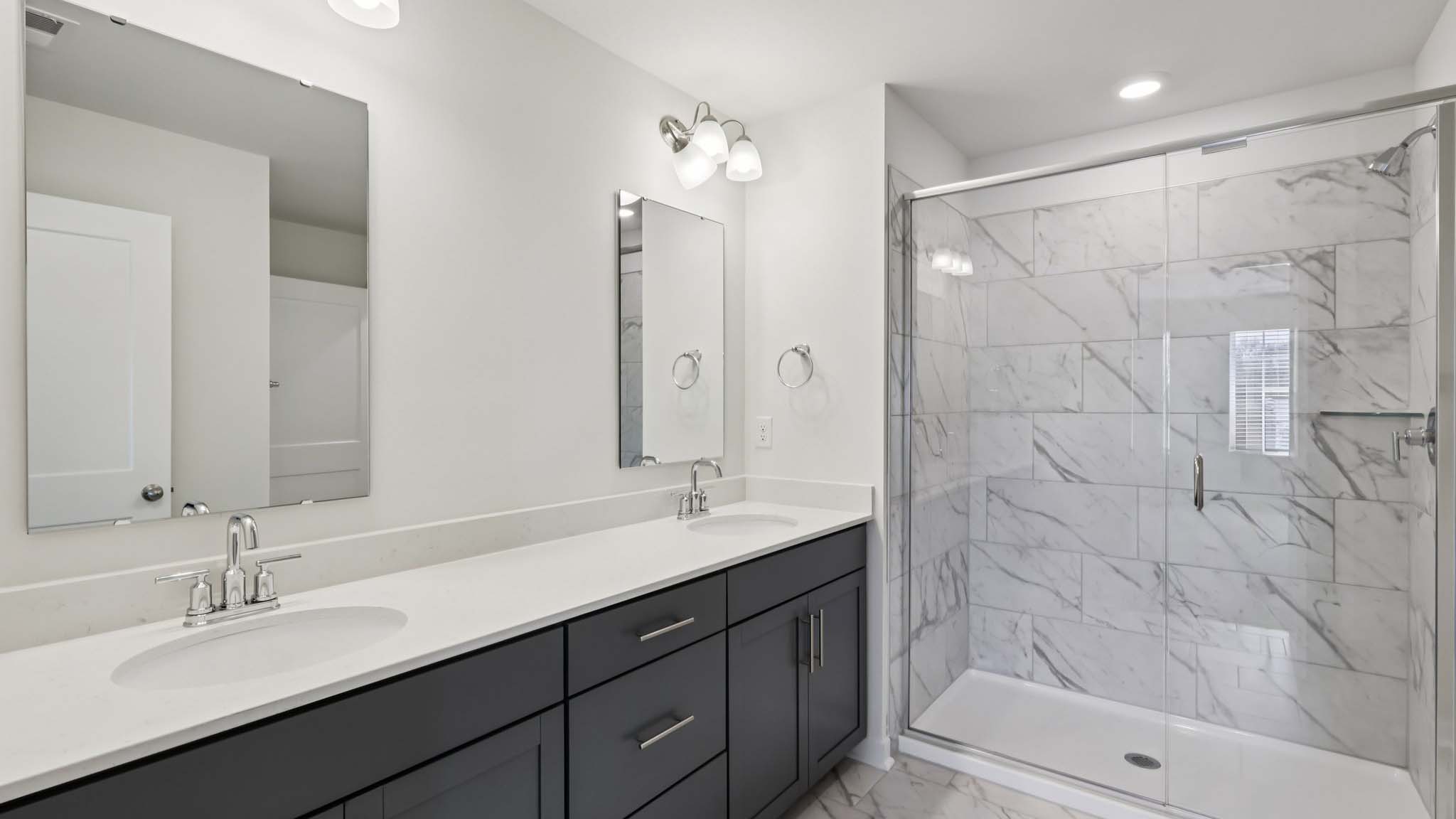Primary bathroom with standing glass shower
