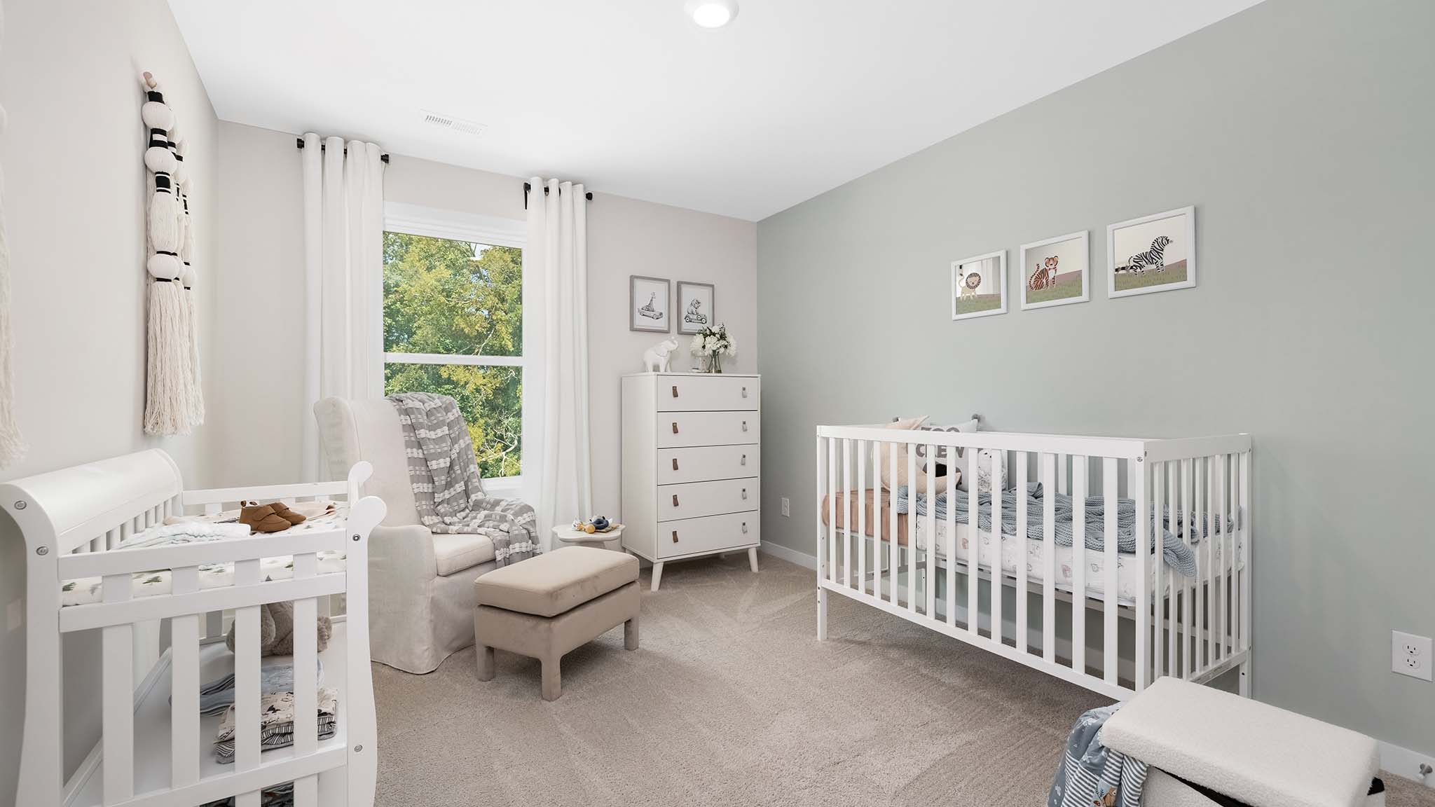 Carpeted bedroom with large window