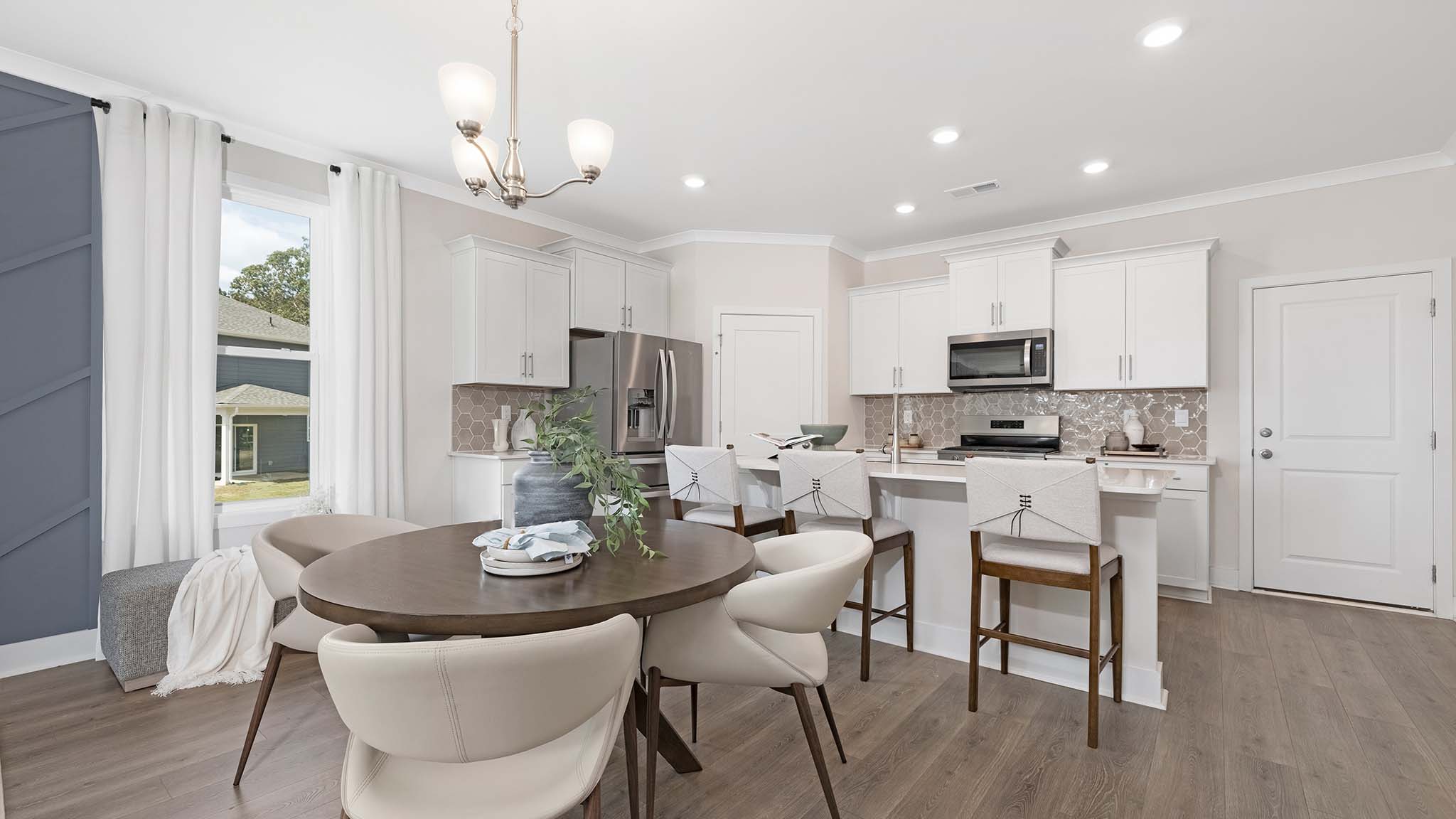 Breakfast area off the kitchen with windows