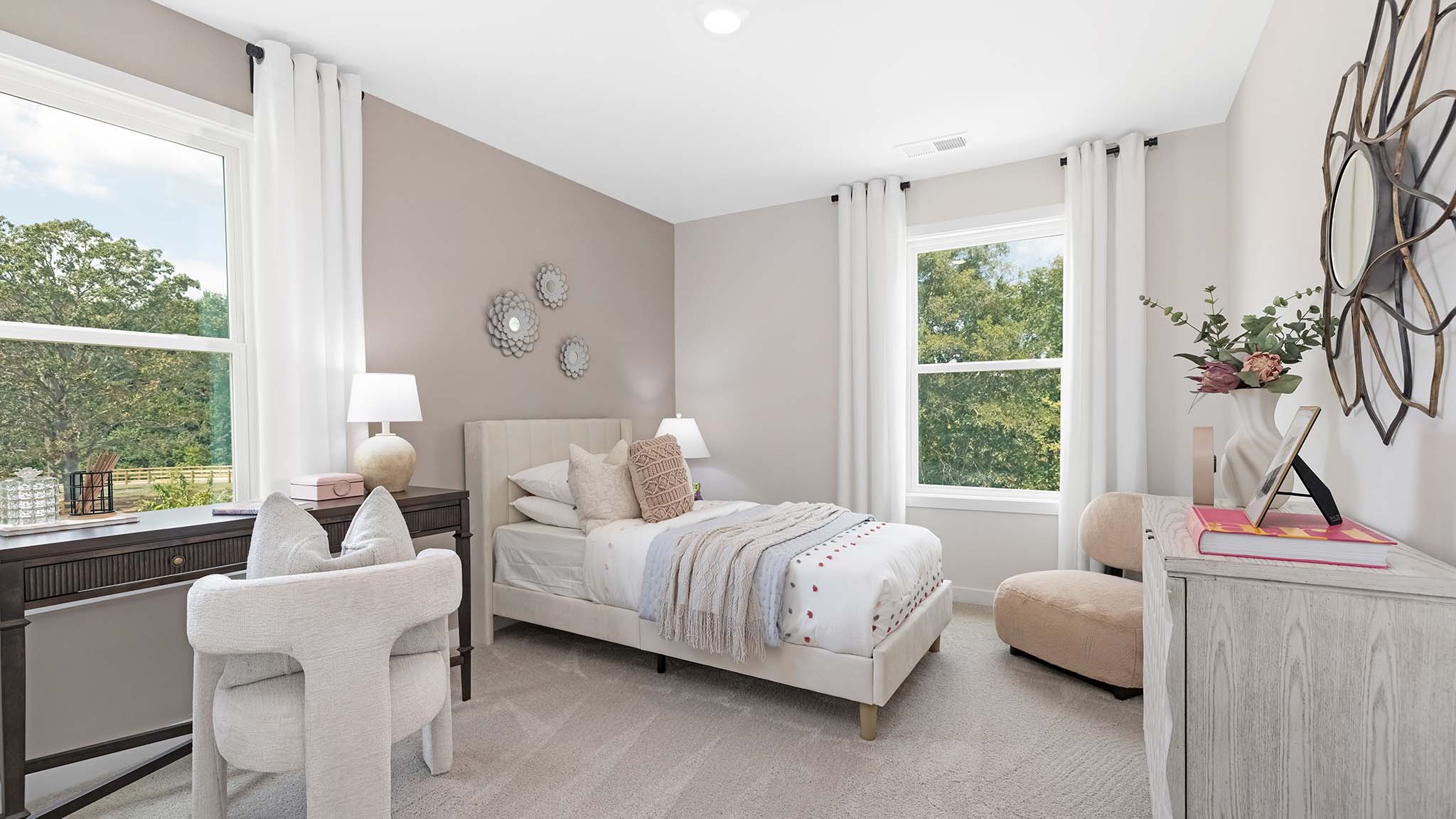 Carpeted bedroom with large window