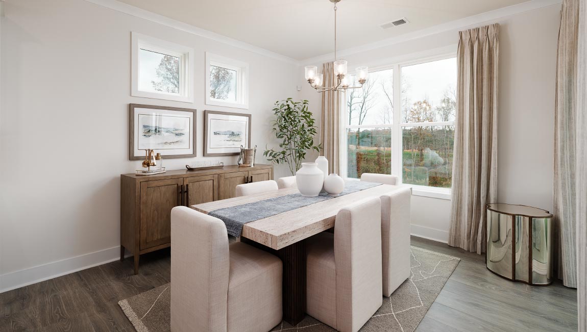 Dining area with large window and sliding glass back door