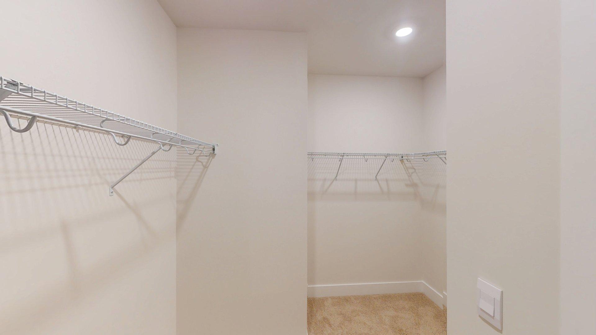 Carpeted walk in closet