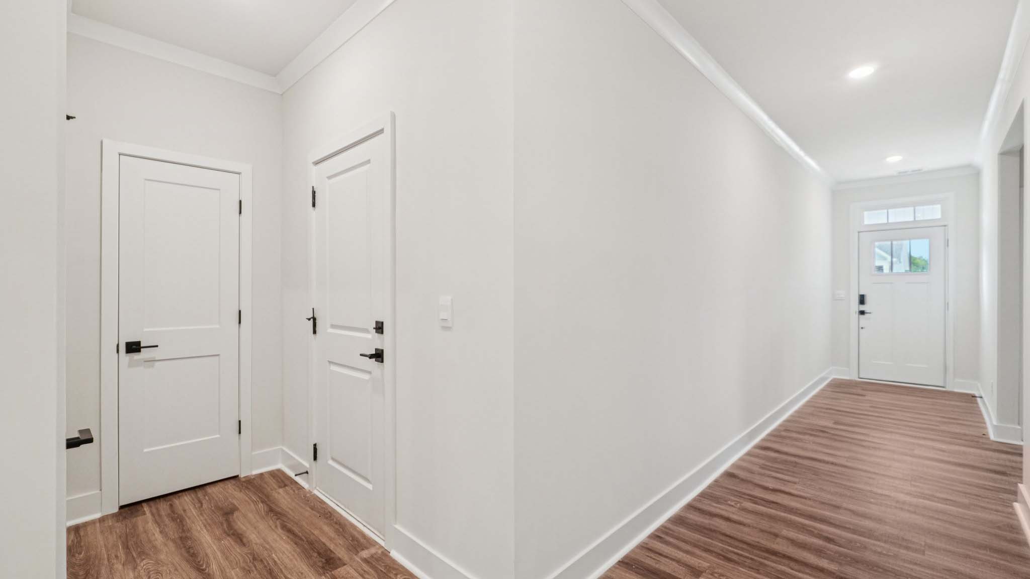hallway with hardwood floors