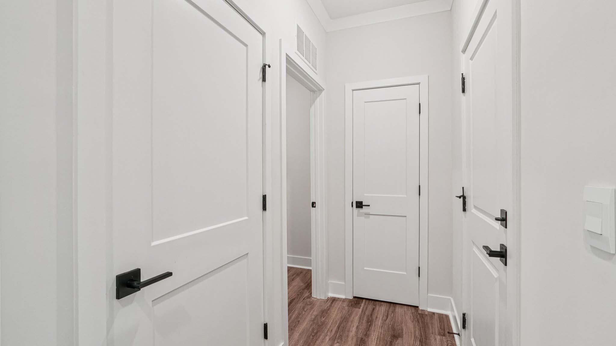 hallway with hardwood floors