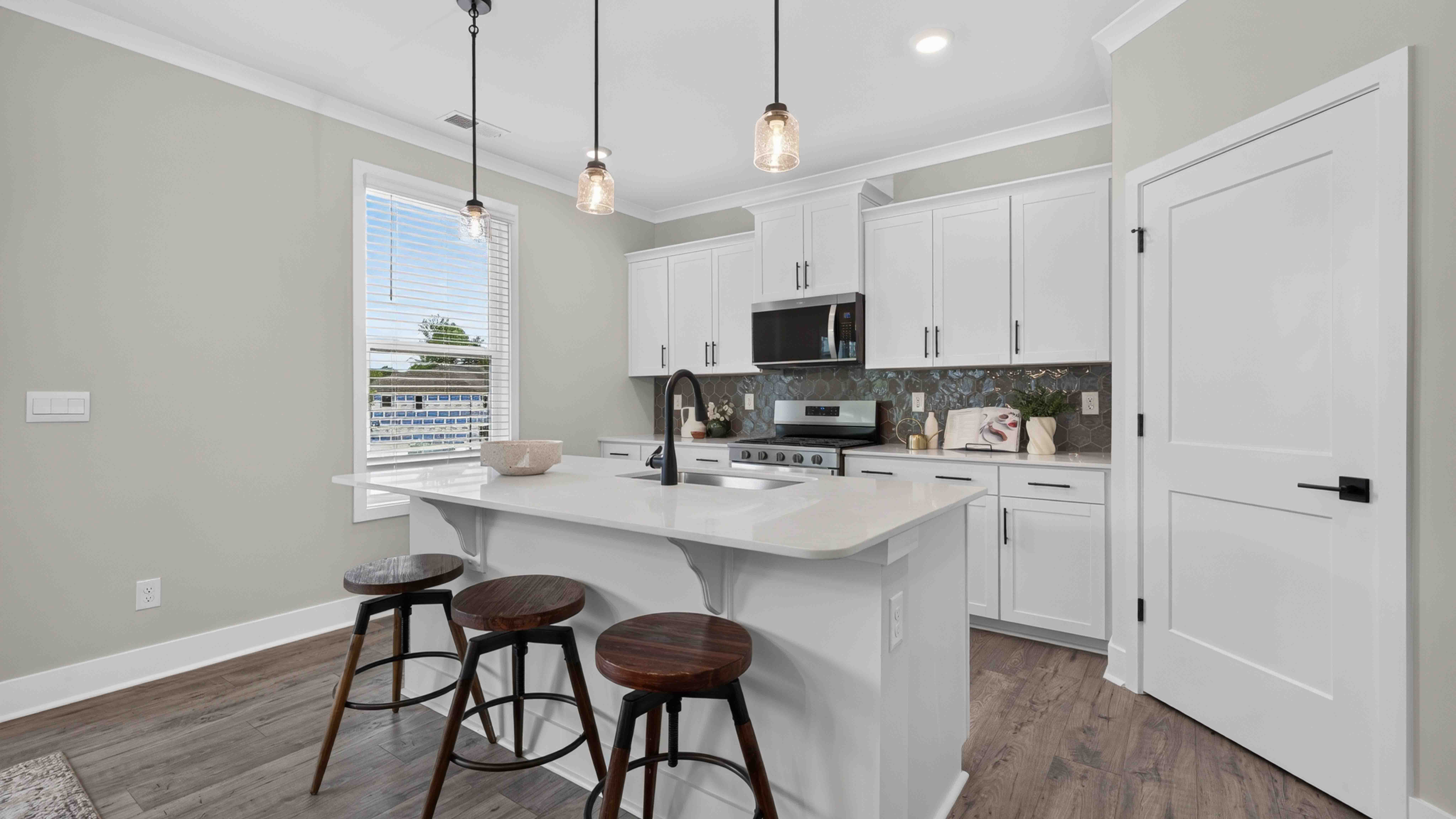 Kitchen and island with windows