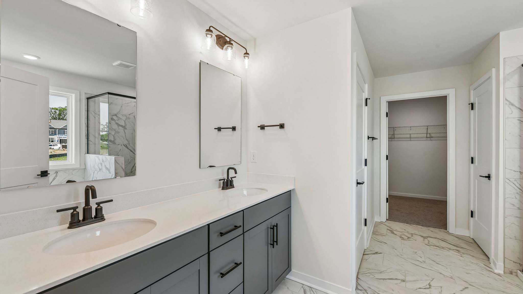 Primary bathroom with standing glass shower