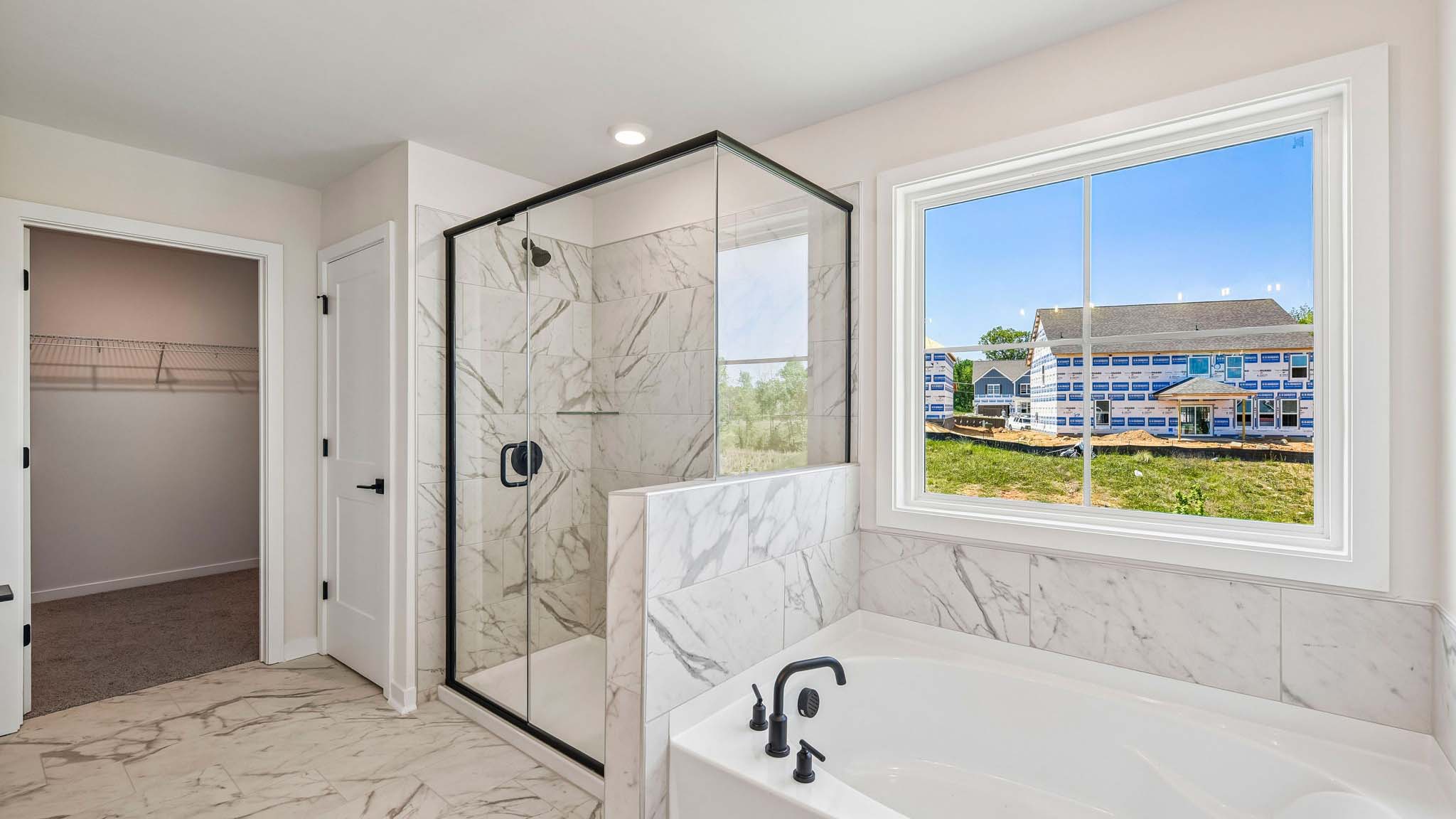 Primary bathroom with standing glass shower