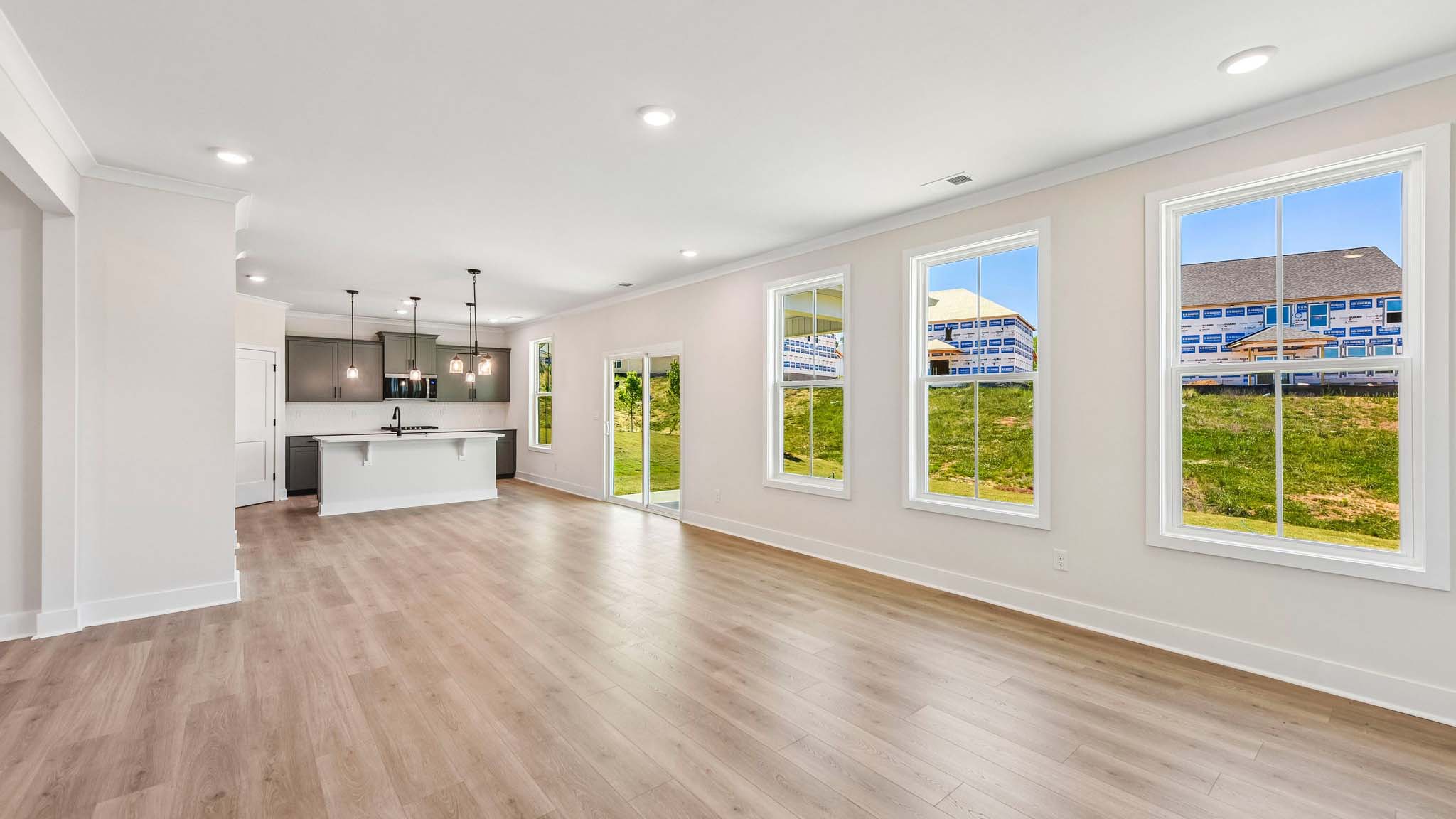 Living room area with windows