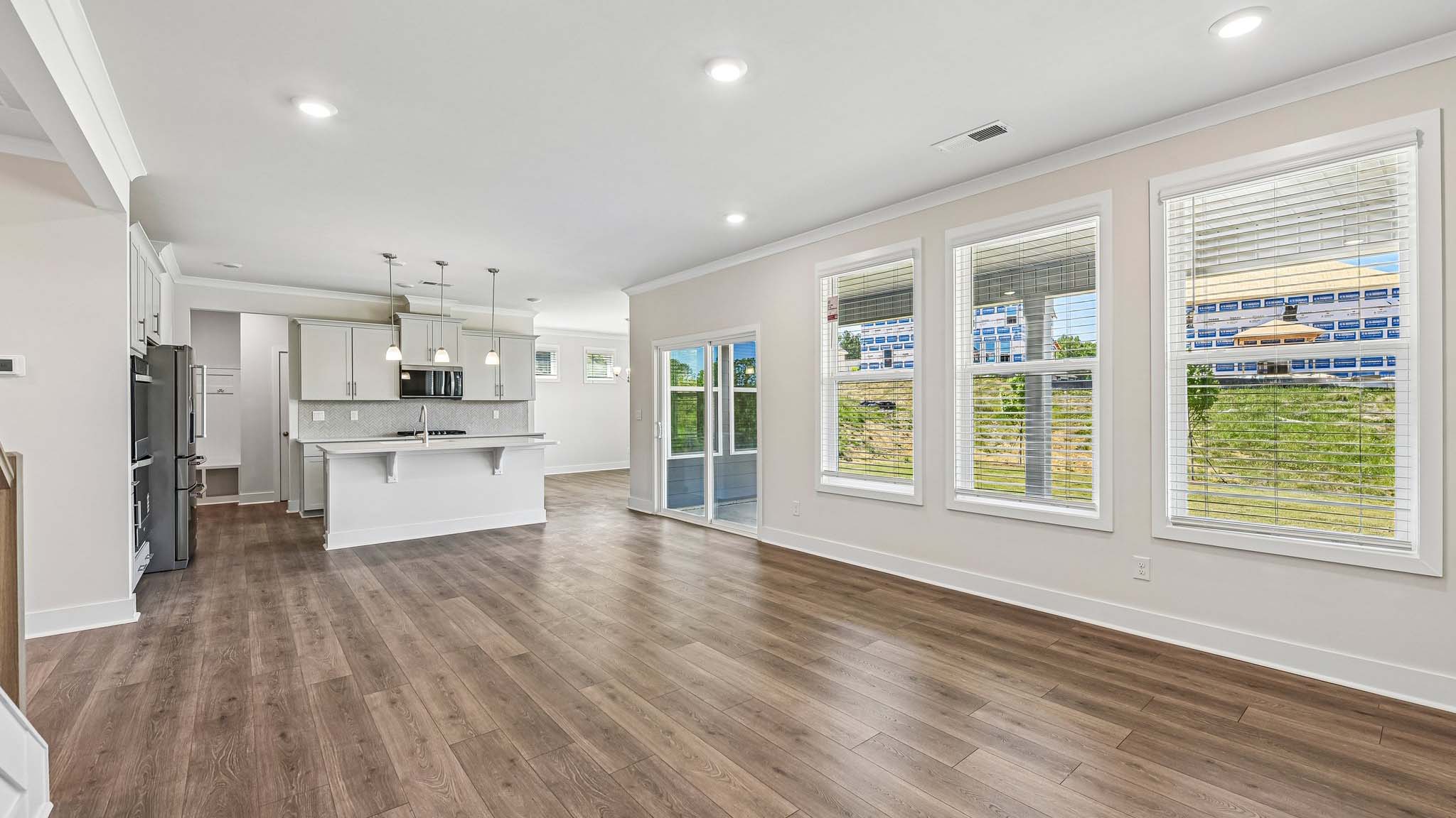 Living room with fireplace and windows