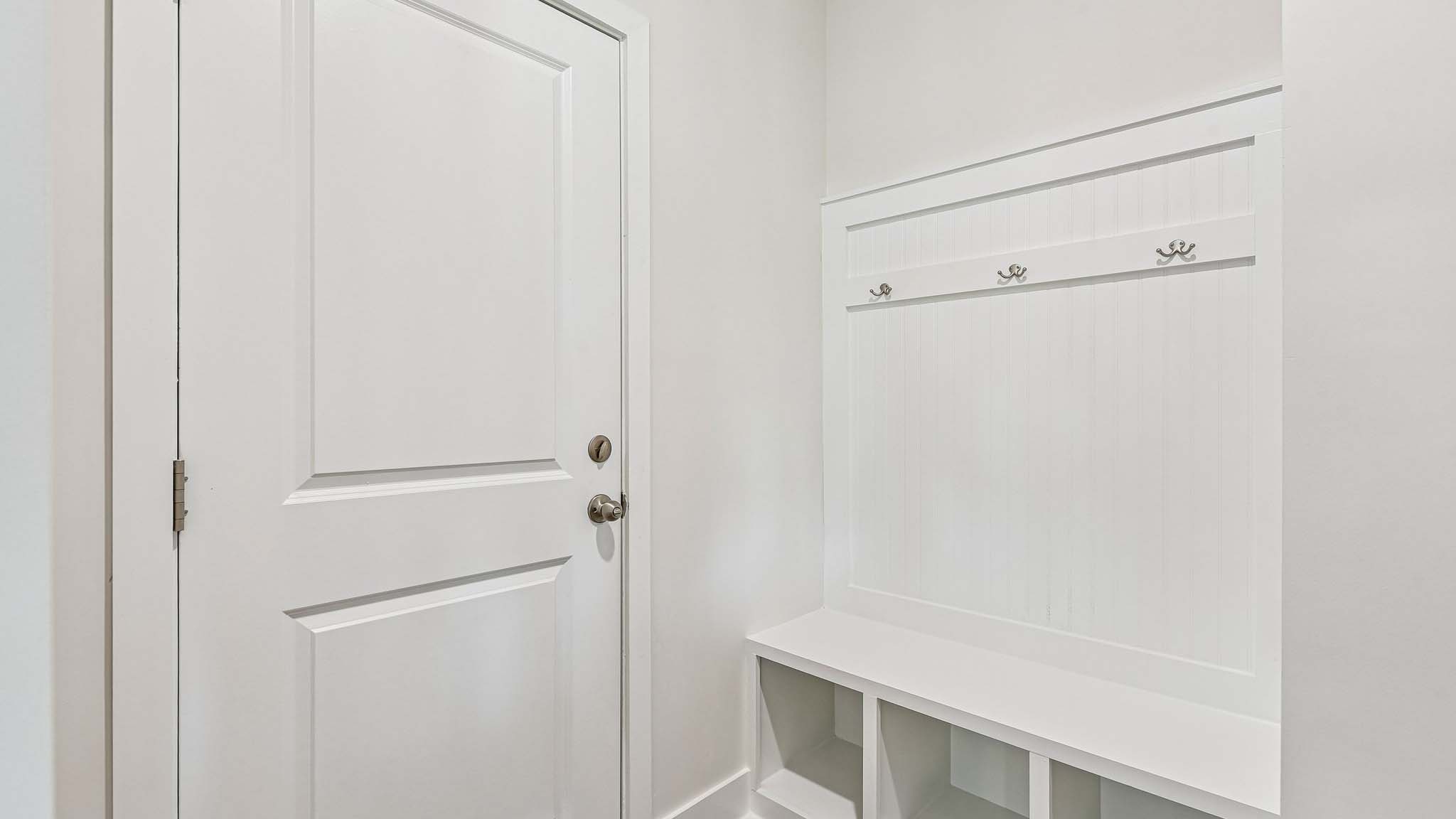 Mudroom with door to garage