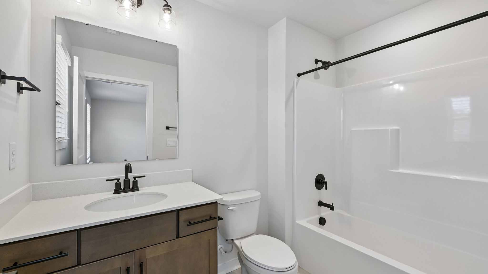 Bathroom with tub shower combination