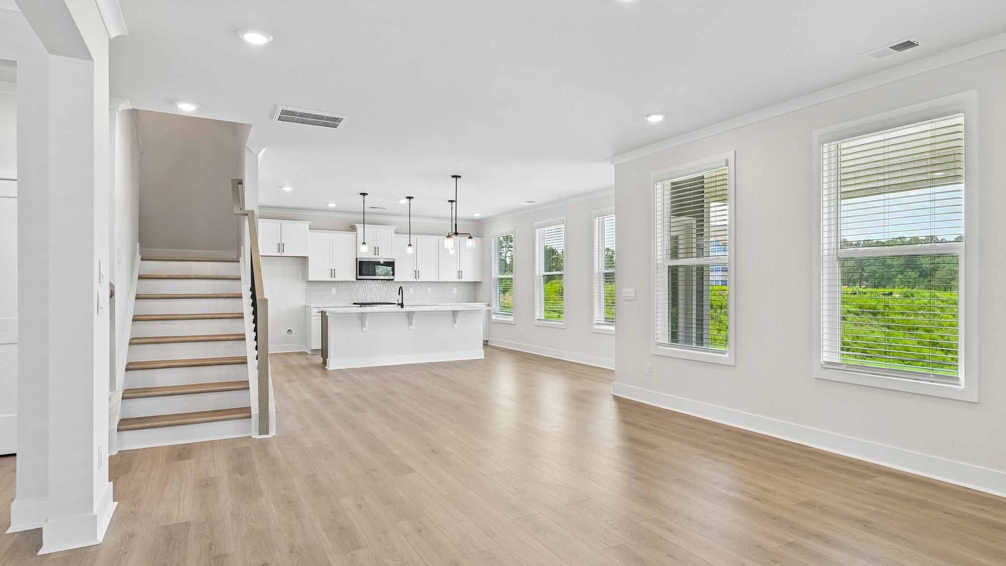 Living room with windows and fireplace