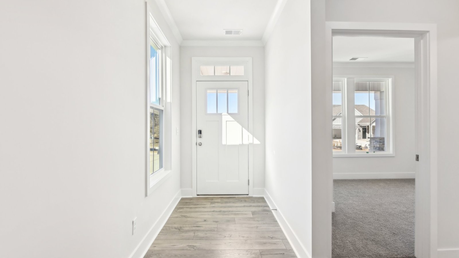 Welcoming foyer with view of front hallway.