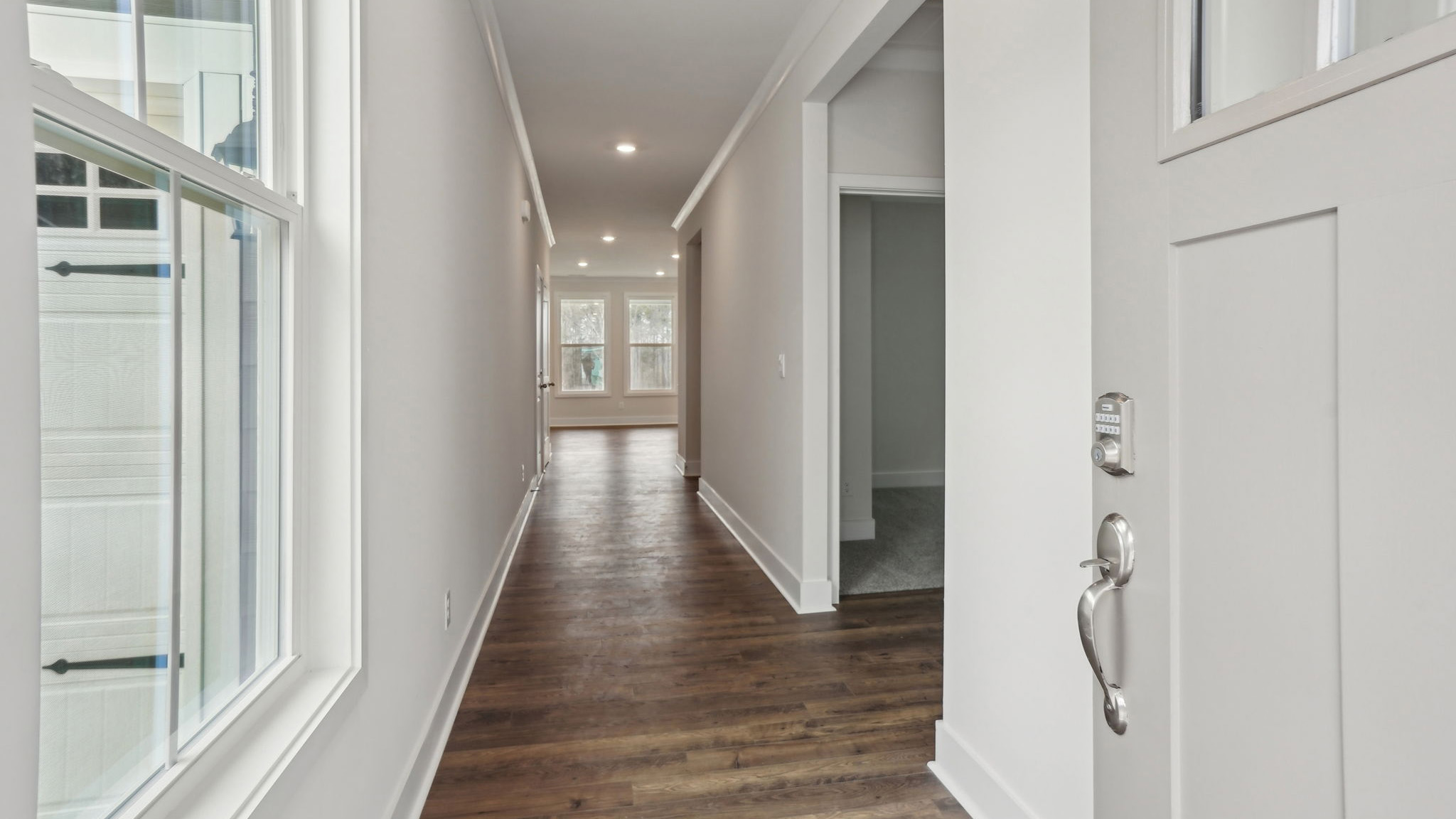 Welcoming foyer with view of front hallway.