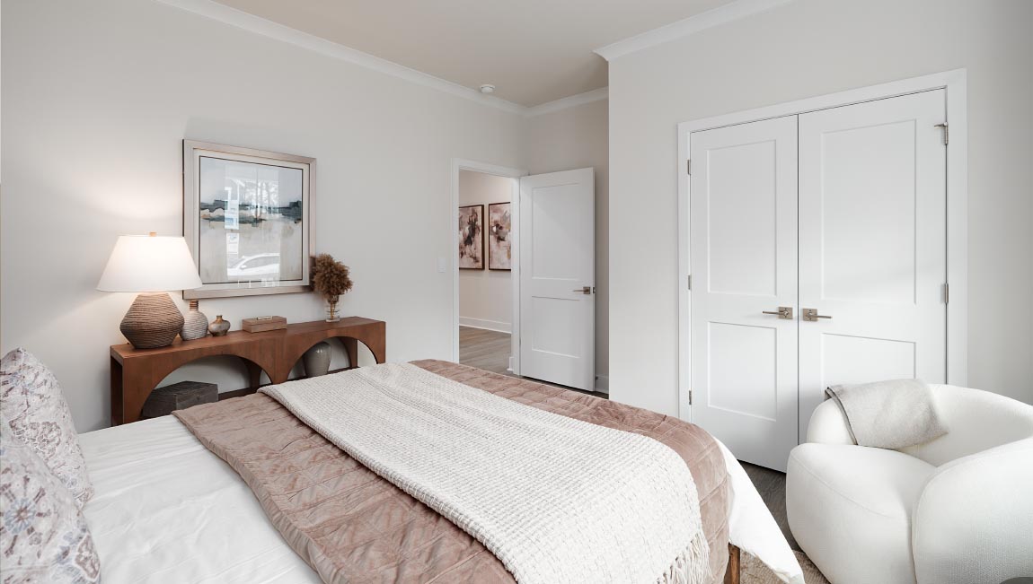 Hardwood bedroom with windows