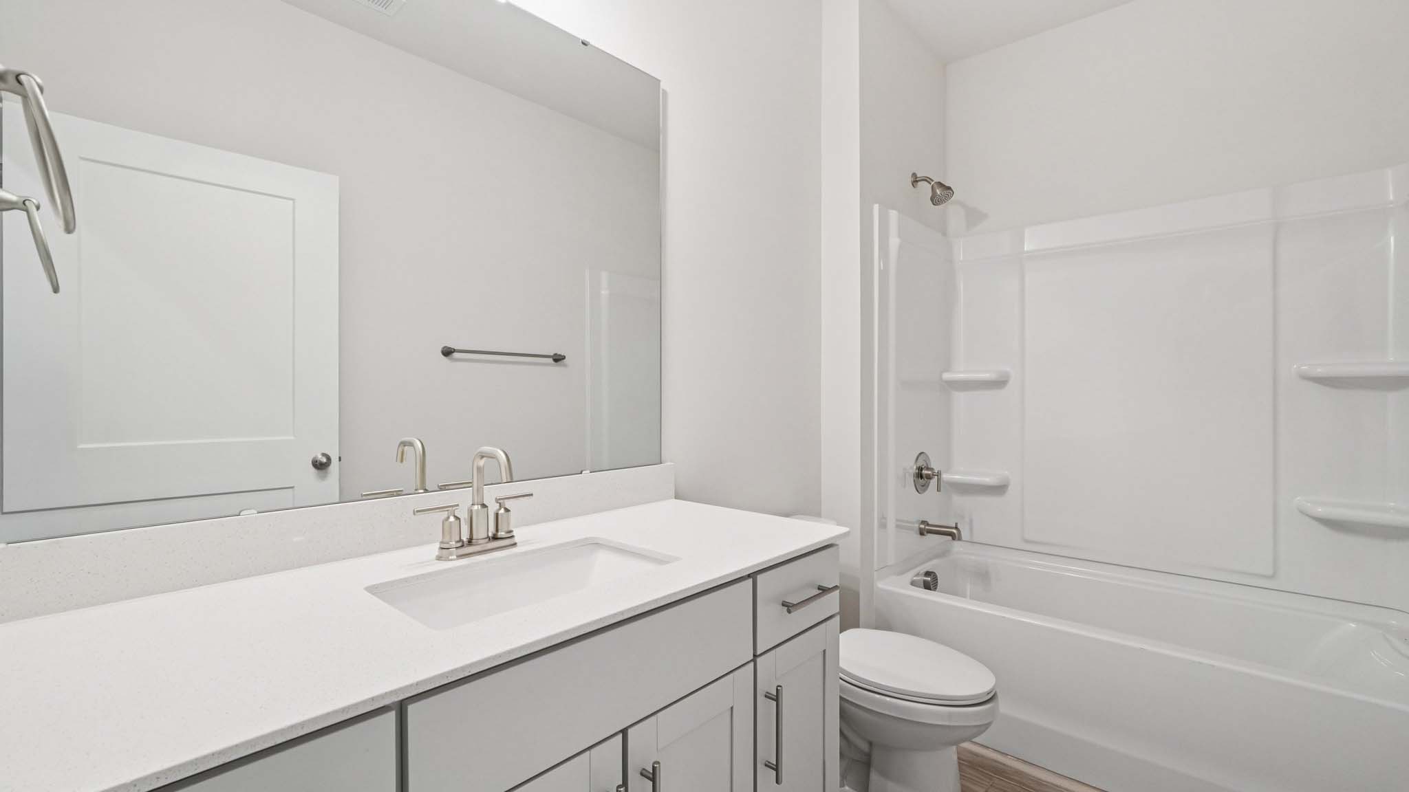 Bathroom with tub shower combination