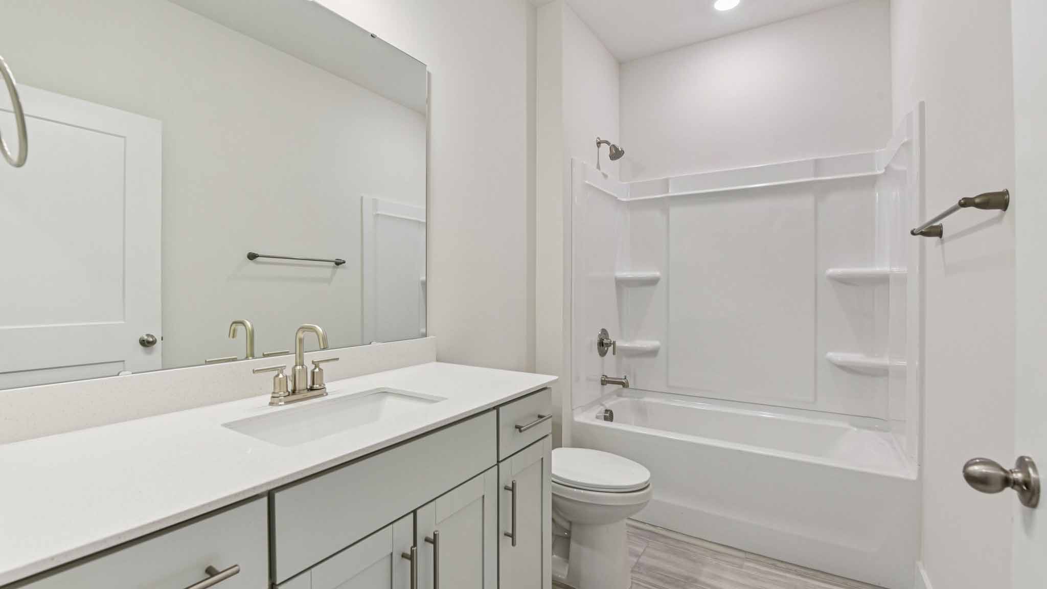 Bathroom with tub shower combination