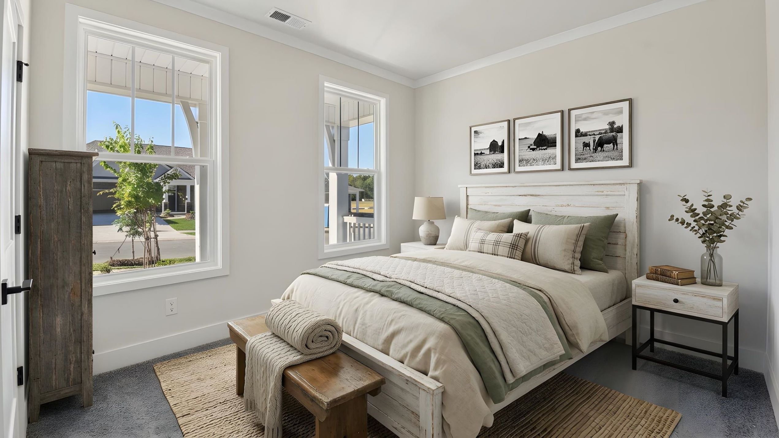 Carpeted bedroom with large windows