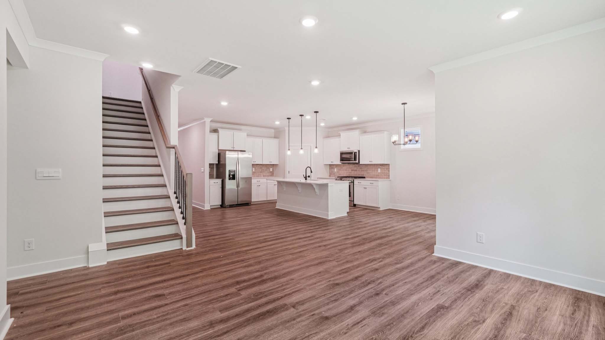 Large living room beside kitchen