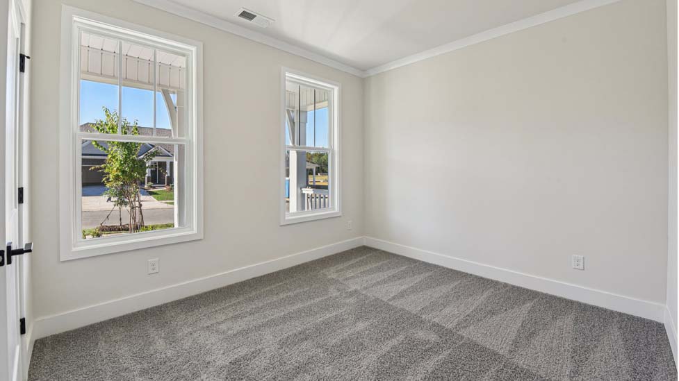 bedroom with windows