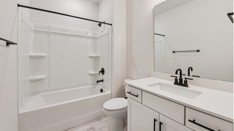 Bathroom with tub shower combination