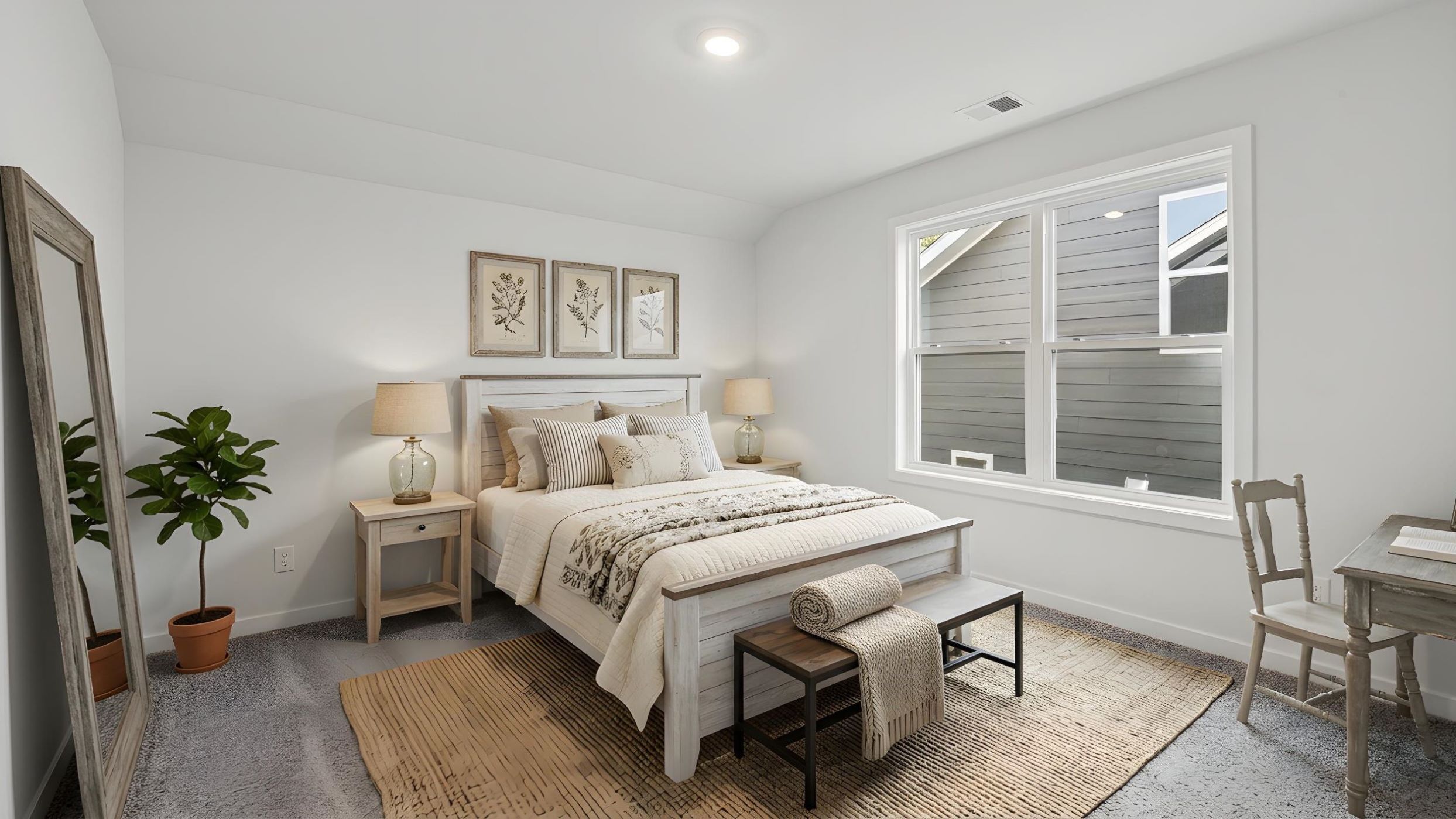 Carpeted bedroom with large windows
