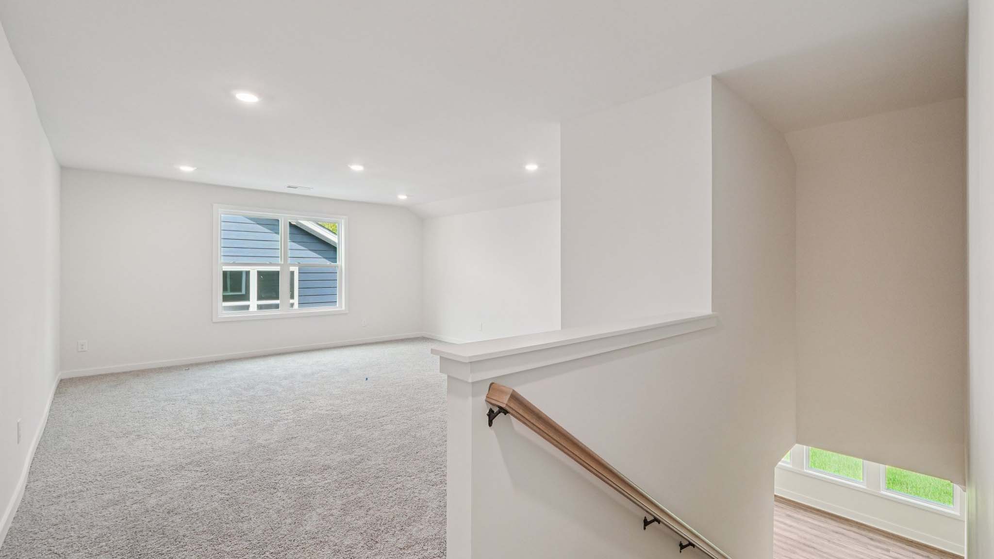 Upstairs carpeted loft