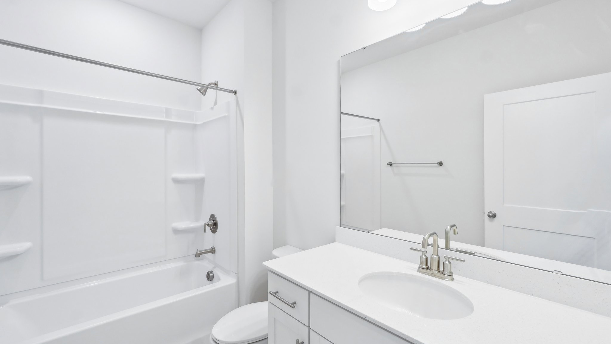 bathroom with bathtub and shower combination