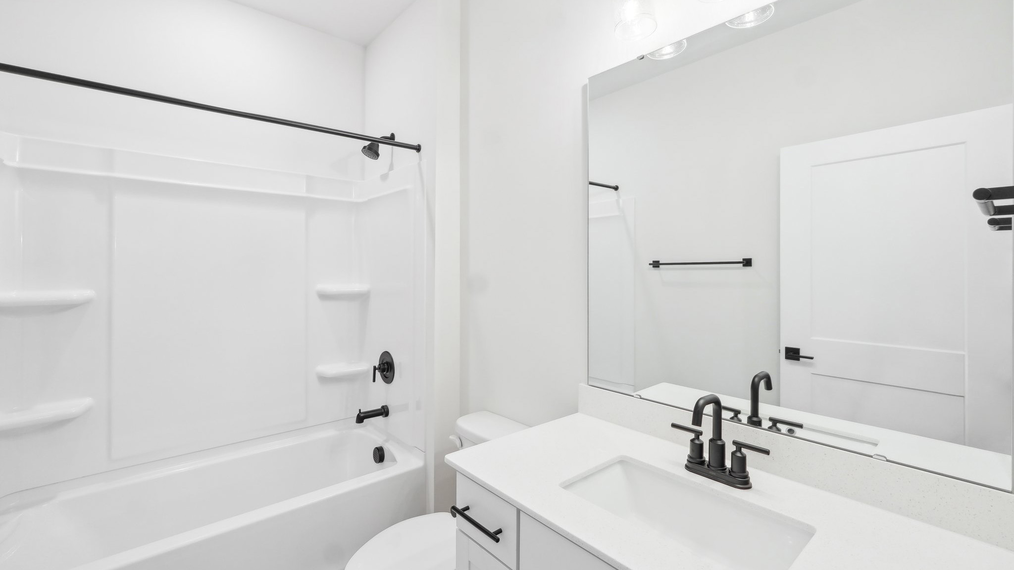 Bathroom with bathtub and shower combination