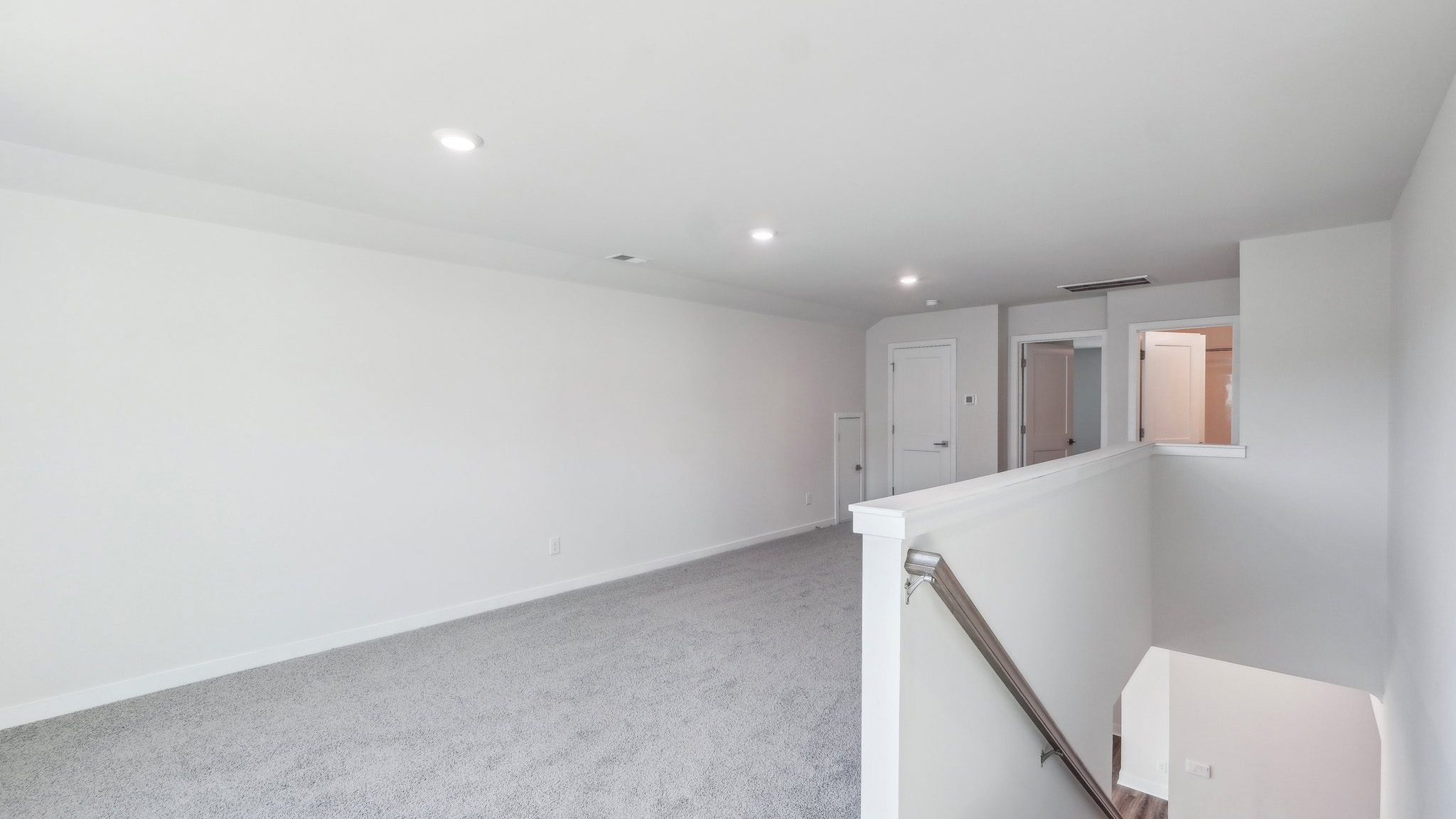 Upstairs carpeted loft