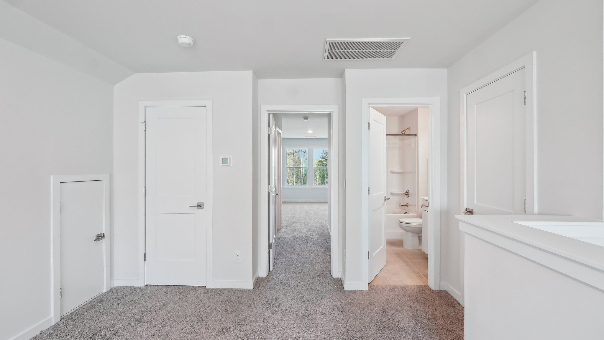 Upstairs carpeted loft