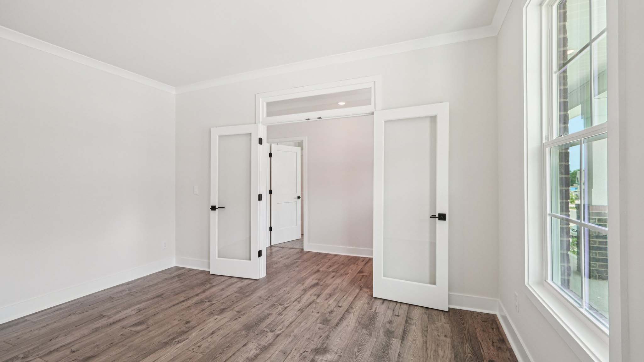 Flex office space with french doors and large window