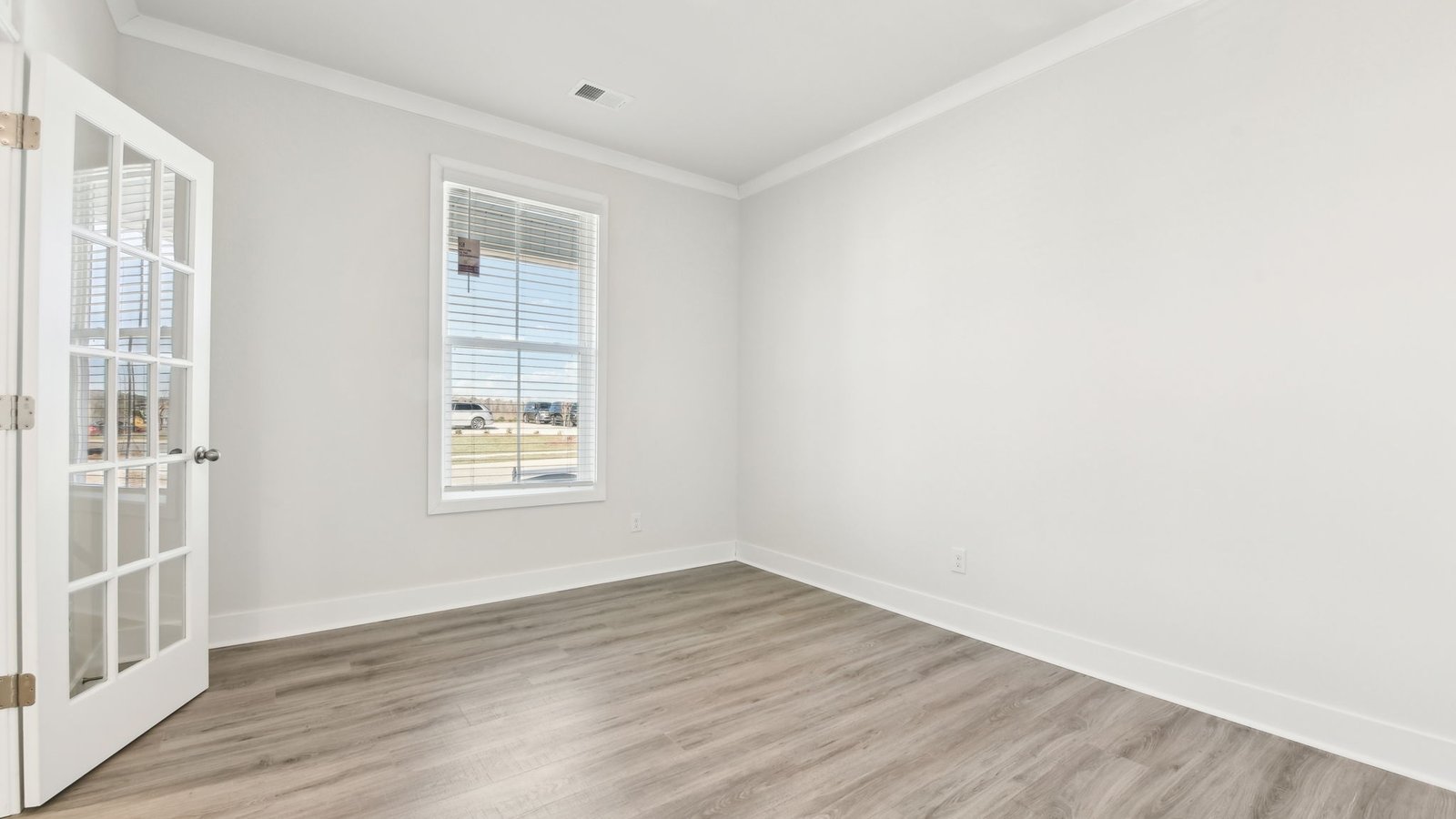 Flex office space with french doors and large window