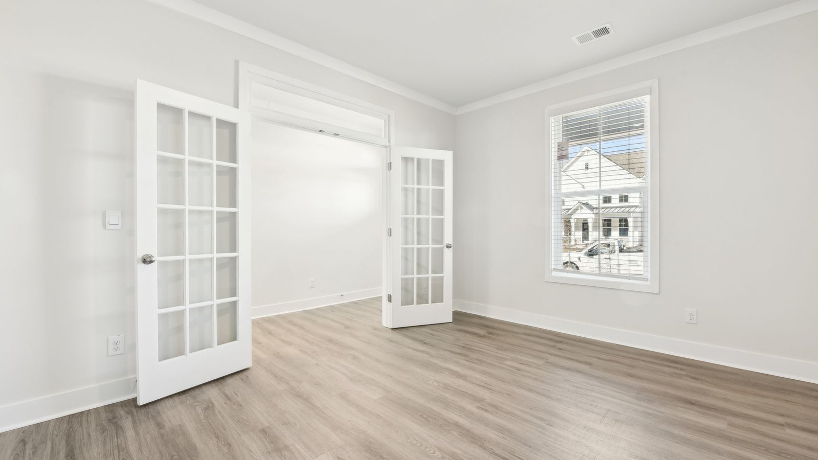 Flex office space with french doors and large window