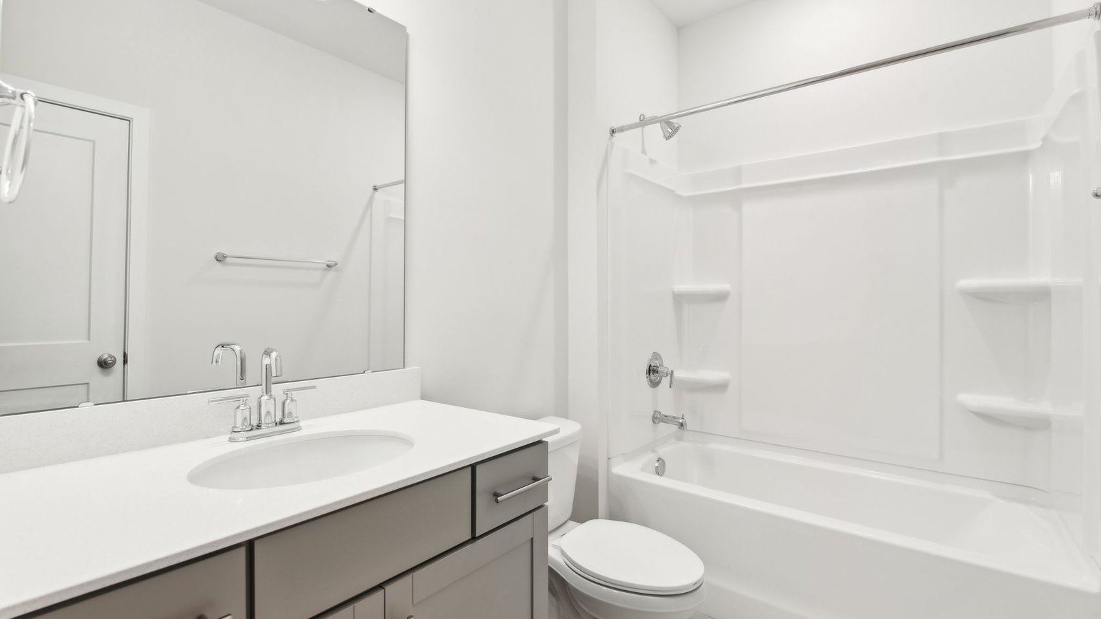 bathroom with bathtub and shower combination