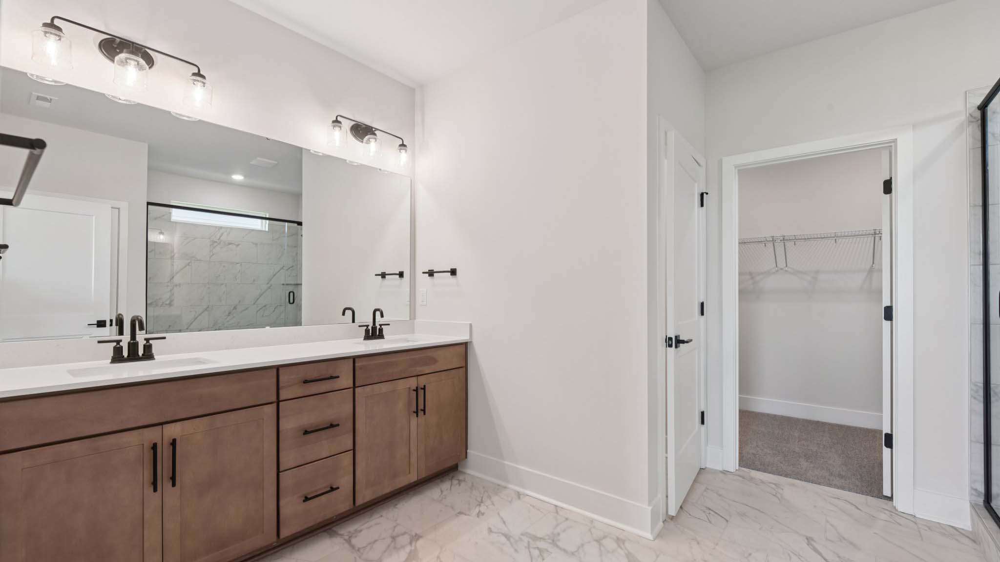 Primary bathroom with standing glass shower