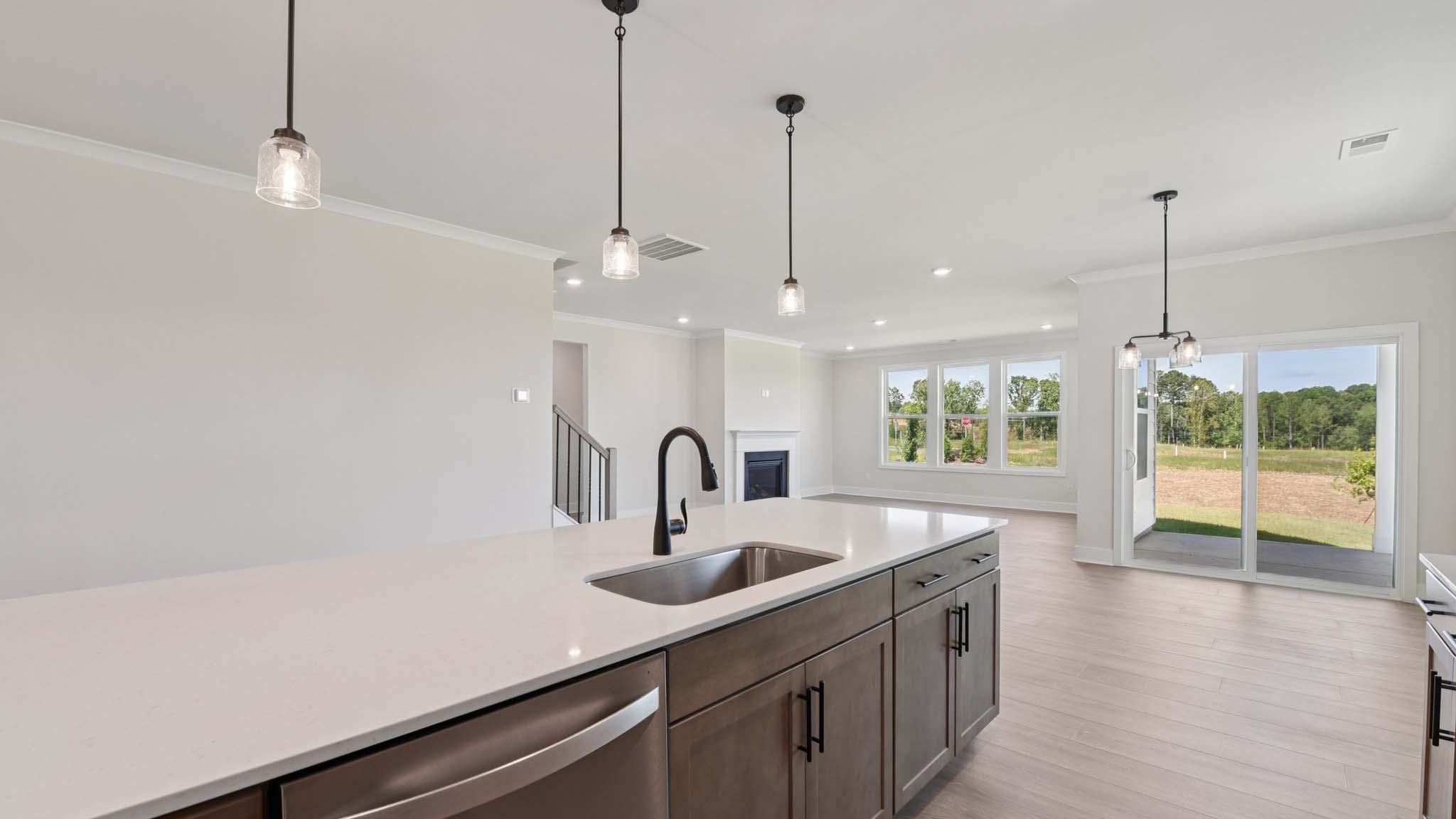 Large kitchen and island with stainless steel appliances